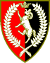 Gleann Abhann - Blazon: Per pale gules and sable, a ram rampant within a laurel wreath, in chief a coronet argent