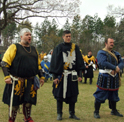 Three knights of the Kingdom, Duncan, Siegfried, and Raito, begging the boon for Roisin's elevation to the chivalry