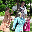 Youth playing ring around the tree